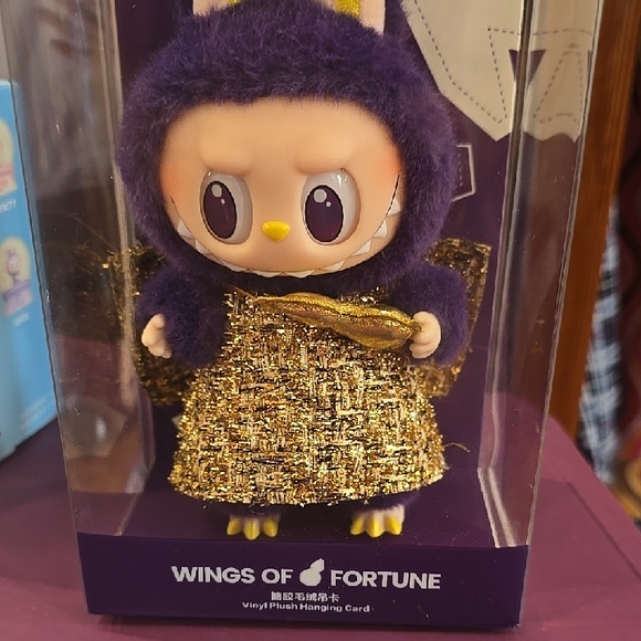 Wings of Fortune Purple and Gold Coffee Table Book